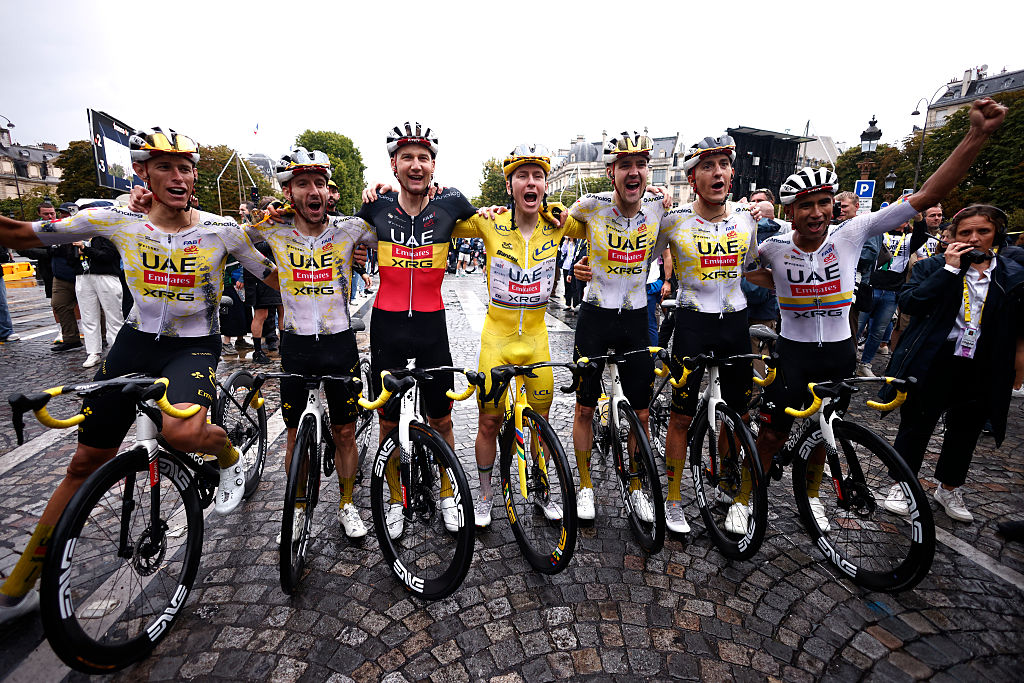 PARIS - CHAMPS-ELYSEES, FRANCE - JULY 27: The final overall winner, Tadej Pogacar of Slovenia and UAE Team Emirates - XRG - Yellow leader jersey celebrates with his teammates Jhonatan Narvaez of Ecuador, Nils Politt of Germany, Pavel Sivakov of France, Marc Soler of Spain, Tim Wellens of Belgium, Adam Yates of Great Britain after the 112th Tour de France 2025, Stage 21 a 132.3km stage from Mantes-la-Ville to Paris - Champs-Elysees / #UCIWT / on July 27, 2025 in Paris - Champs-Elysees, France. (Photo by Yoan Valat - Pool/Getty Images)