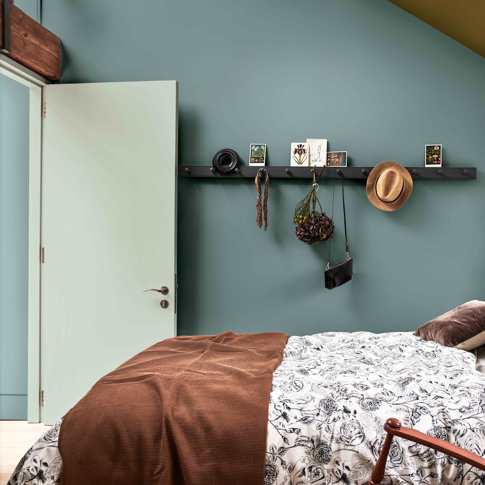 bed in bedroom with door open