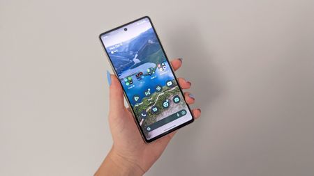 Google Pixel 7 review: phone screen open in front of wall