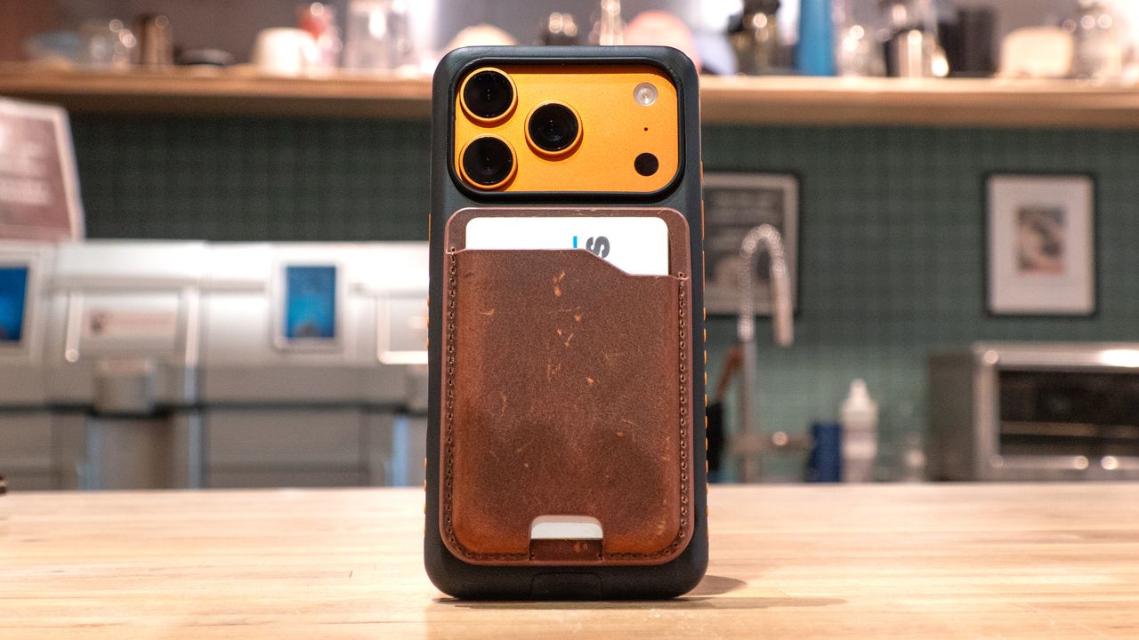 Nomad Leather Mag Wallet on iPhone 17 Pro case.