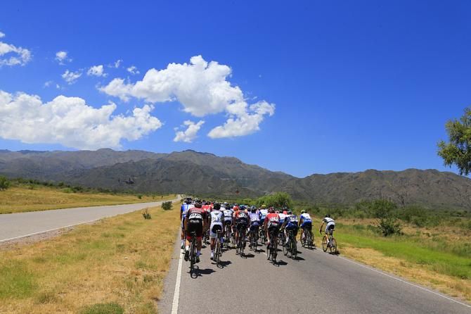 The Tour de San Luis peloton rides to the hills on stage 2