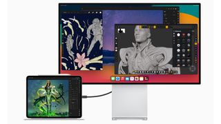 Apple iPad Pro 12.9 M4 connected to Apple Studio Display on a white background