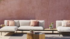 modern outdoor sofa and pink wall
