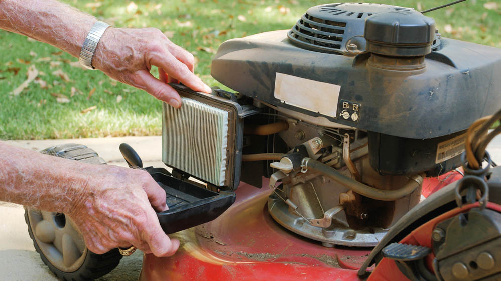 Changing air filter in gas mower
