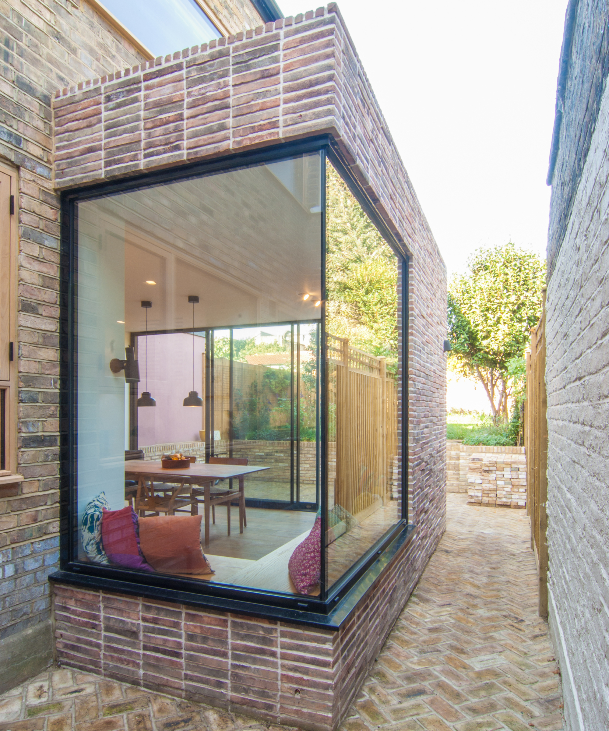 external view of corner glazed section of small house extension