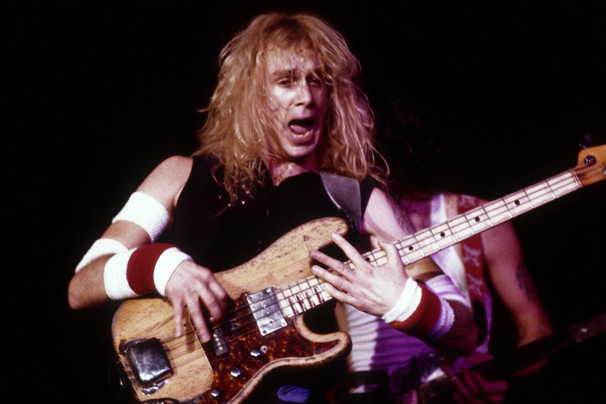 Billy Sheehan performs onstage with the David Lee Roth Band at Cal Expo in Sacramento, California on June 13, 1988