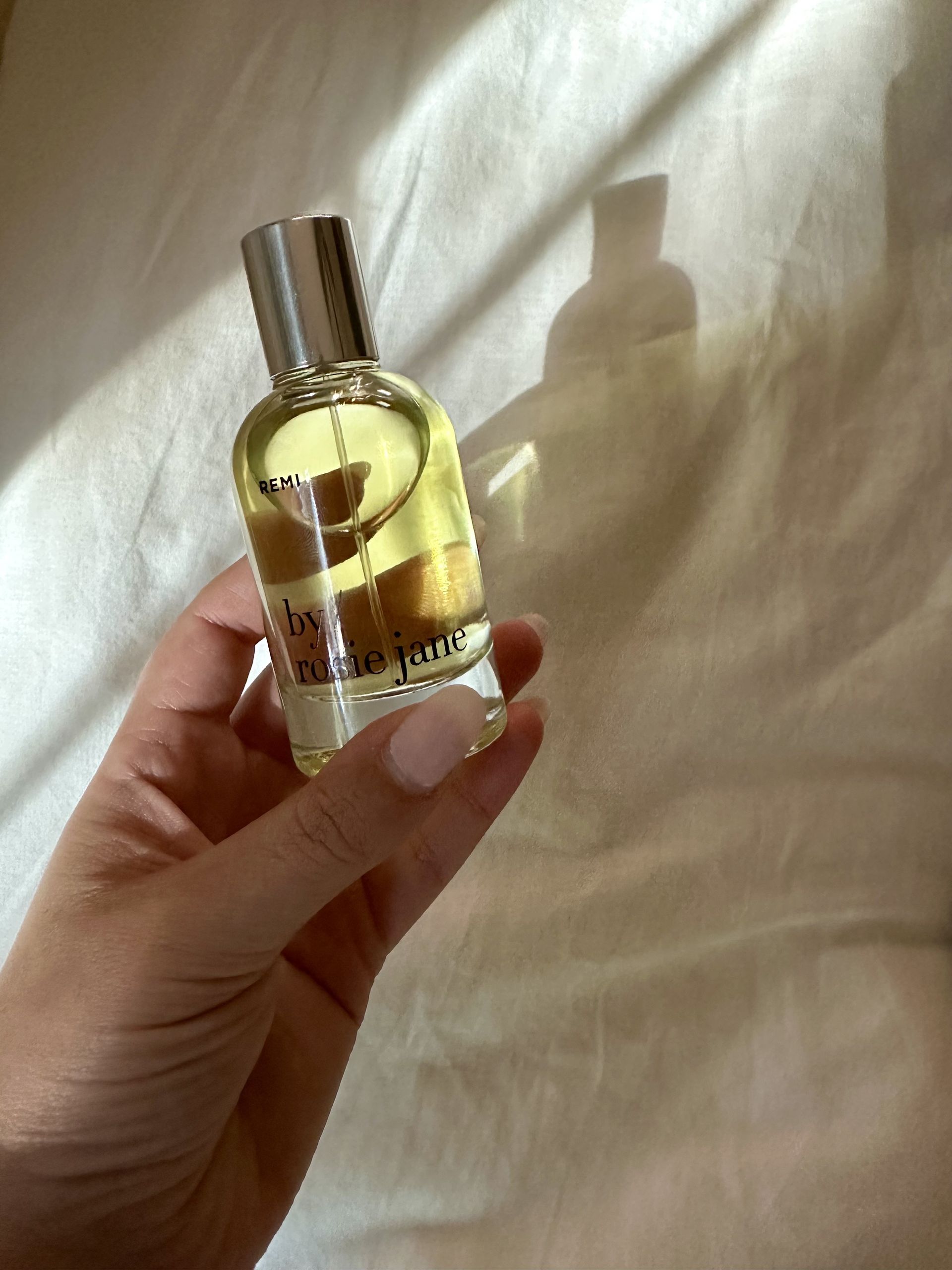 photo of Kaitlyn McLintock testing By Rosie Jane's Remi Eau de Parfum