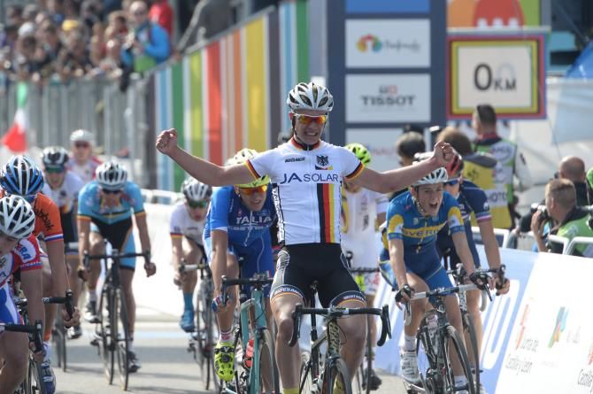 Jonas Bokeloh (Germany) celebrates with his arms in air