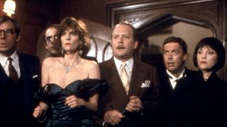 The cast of Clue stand together in shock