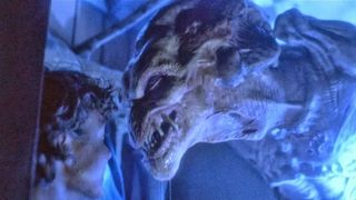 A creature seemingly smiles at its victim in 'Pumpkinhead'