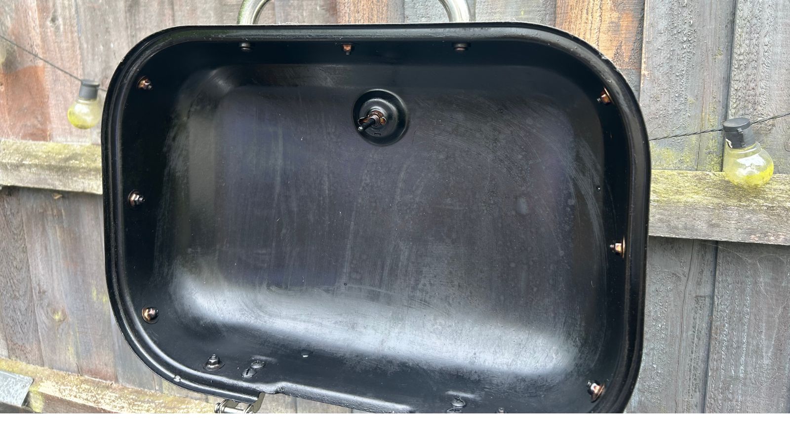 Electric BBQ lid open, after being cleaned