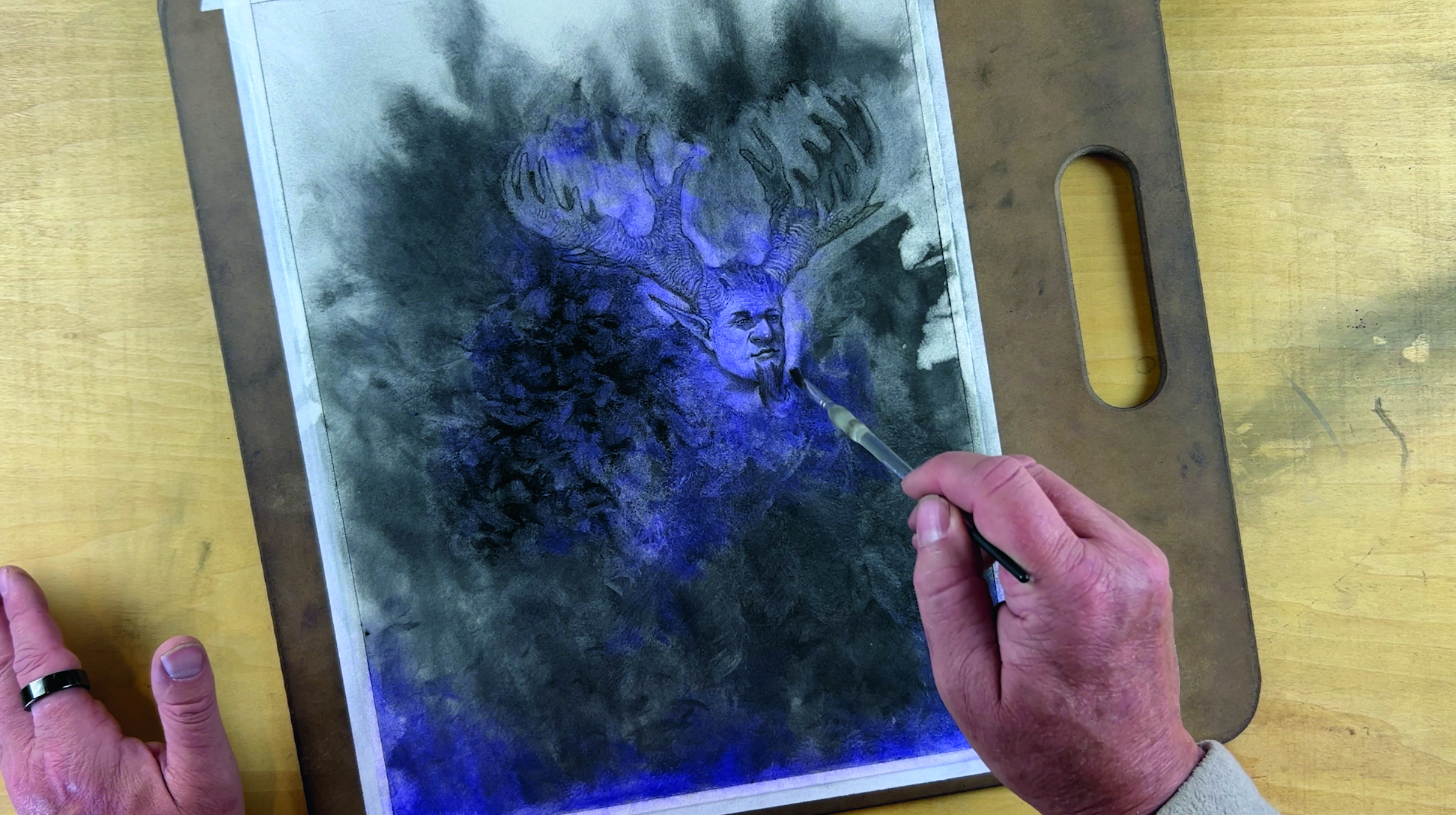 Image of a charcoal abstract character art in progress