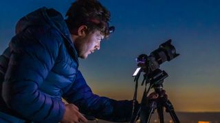 Astrophotographer on location with 14mm lens