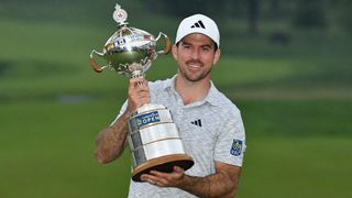 Nick Taylor holding a trophy following his victory at the RBC Canadian Open