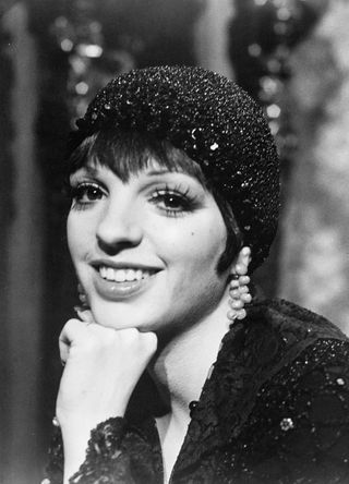 Liza Minnelli in sequinned cap