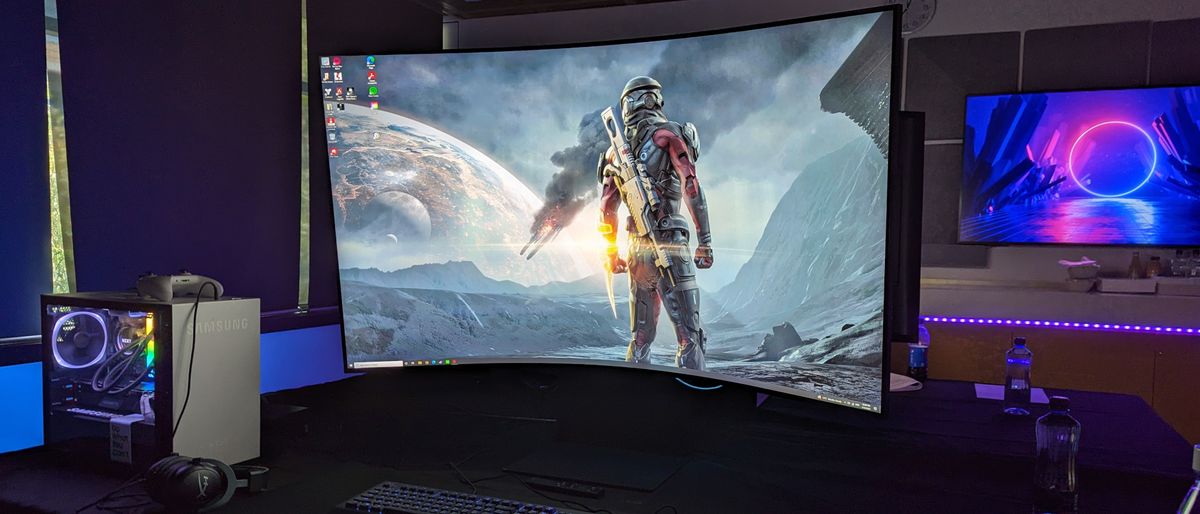 Samsung 55-inch Odyssey Ark Curved UHD Gaming Monitor in use on a desk