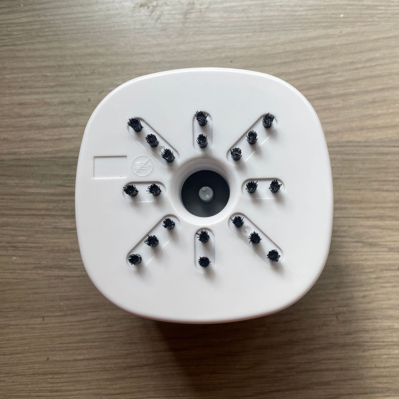 Underside of the Lakeland mini countertop vacuum, showing the bristles