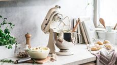 One of my favorite retro small appliances, the KitchenAid Artisan Stand Mixer in cream on a countertop
