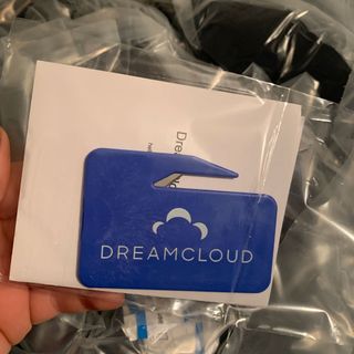 DreamCloud mattress in plastic packaging