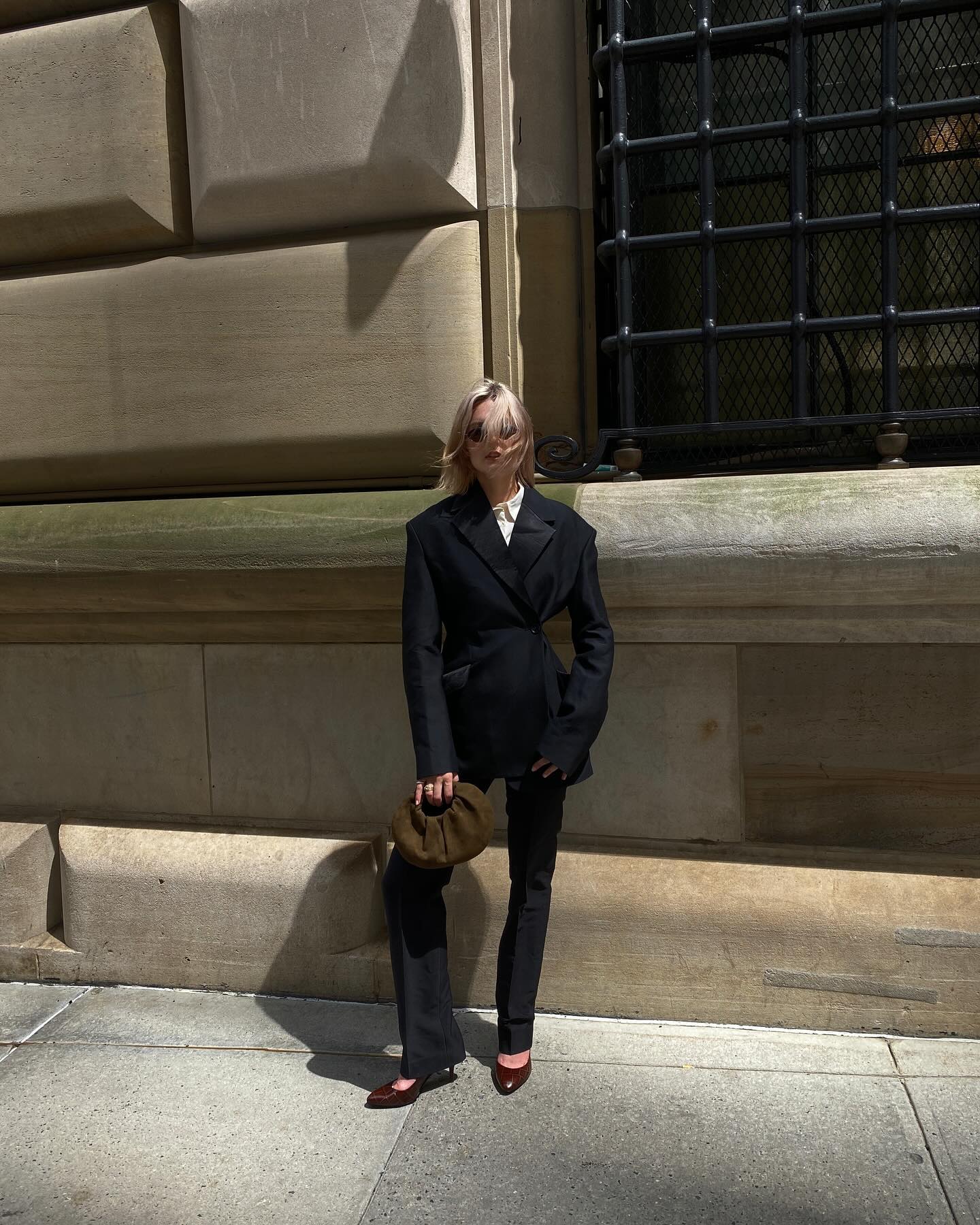 An image of @christietyler wearing cigarette trousers.