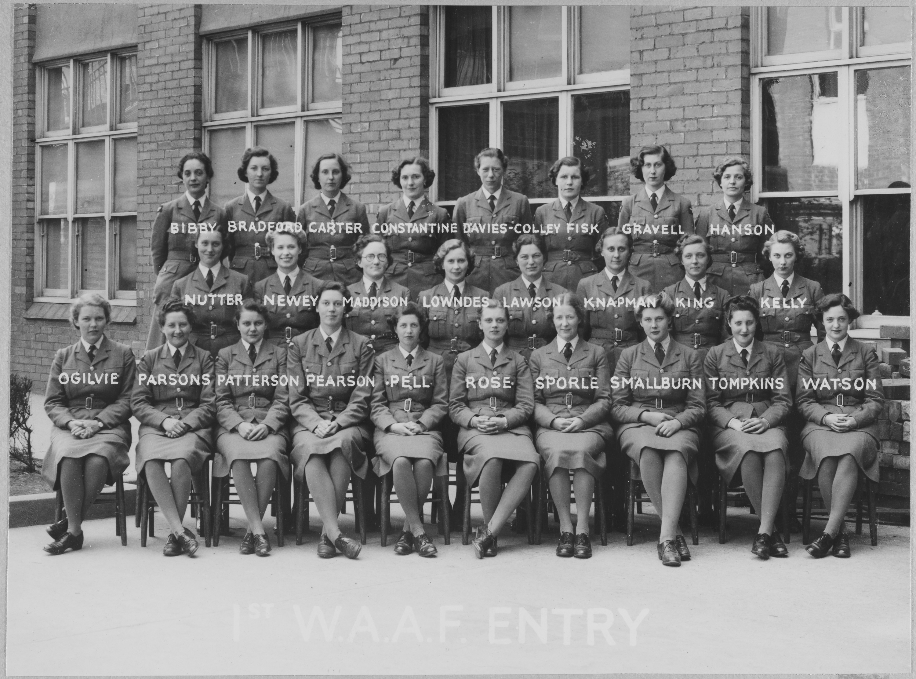 Portrait of the first intake of WAAF (Women's Auxiliary Air Force) recruits to undertake training at the RAF's No. 2 School of Photography in Blackpool