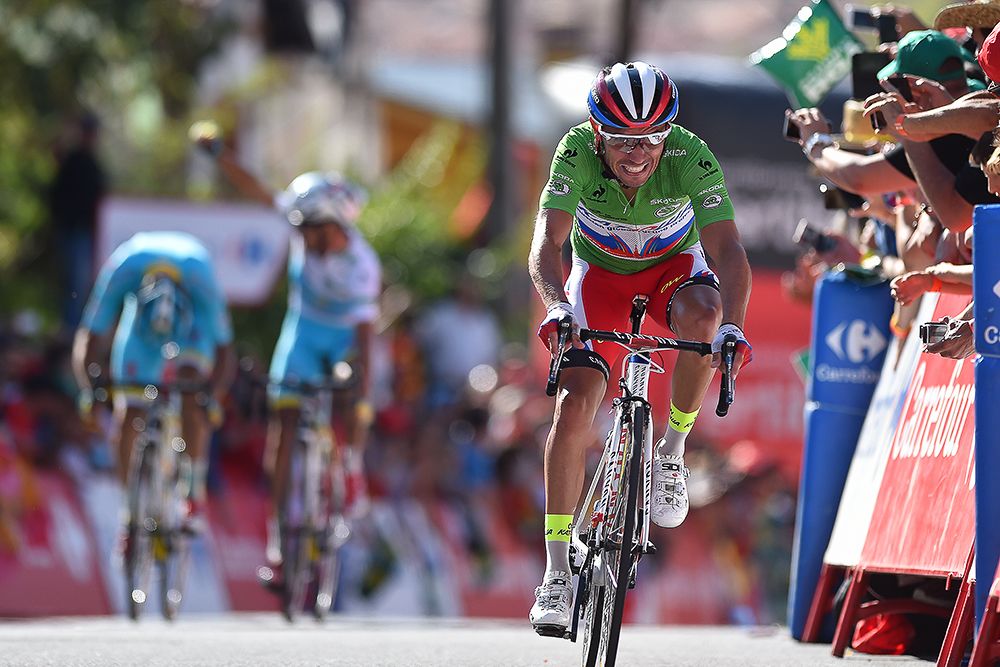 Joaquim Rodriguez finishes stage 20 with Fabio Aru in the background.