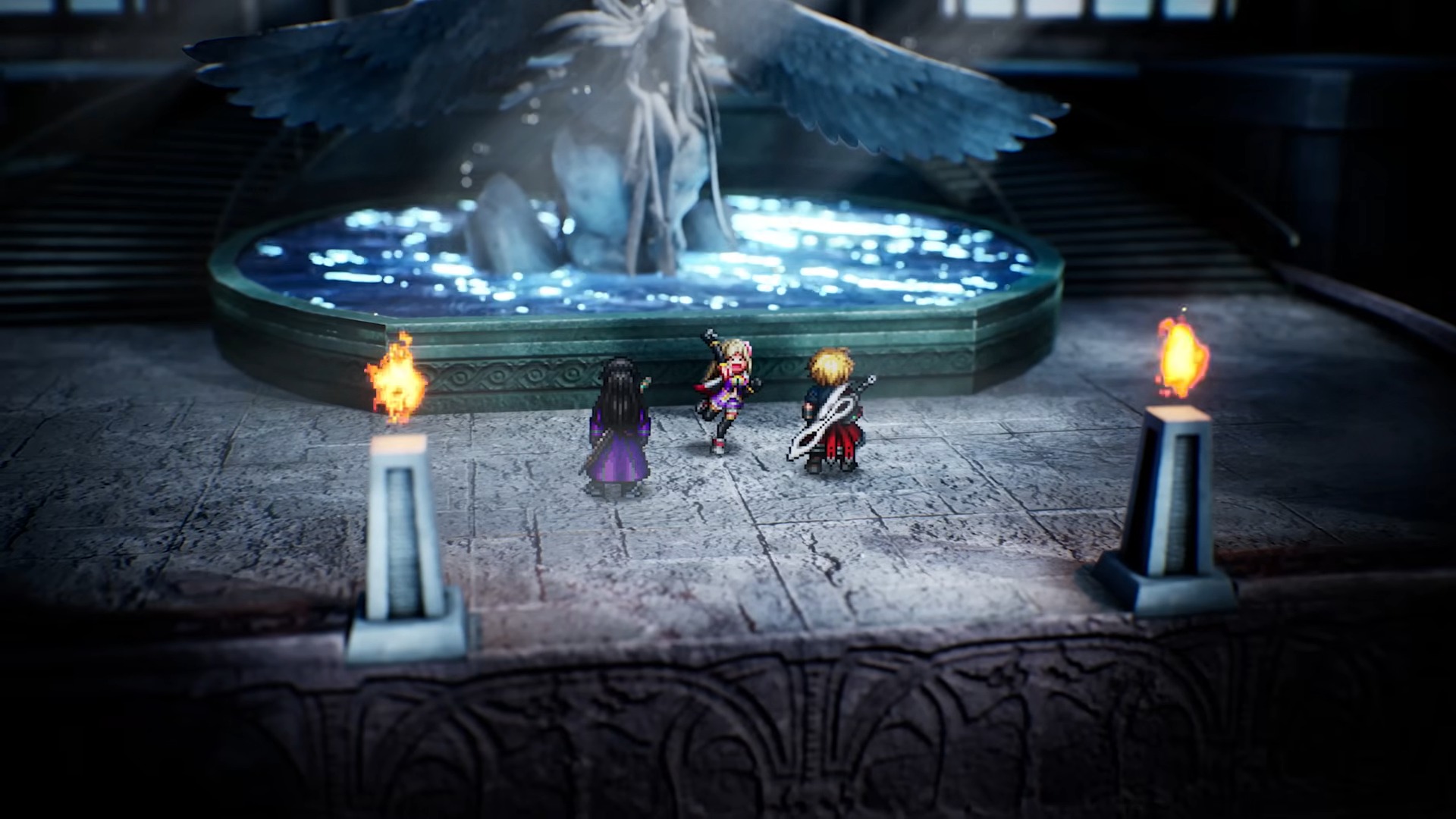 A group of three characters stands in front of a large, illuminated statue within a dimly lit environment. There are torches casting a flickering light, and water is visible in the basin surrounding the statue.