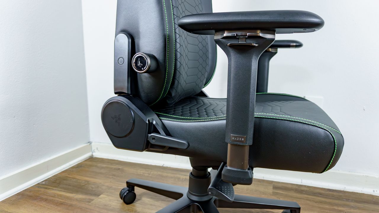 A close-up shot of the lever and adjustment knobs on the right side of the Razer Iskur V2 NewGen gaming chair