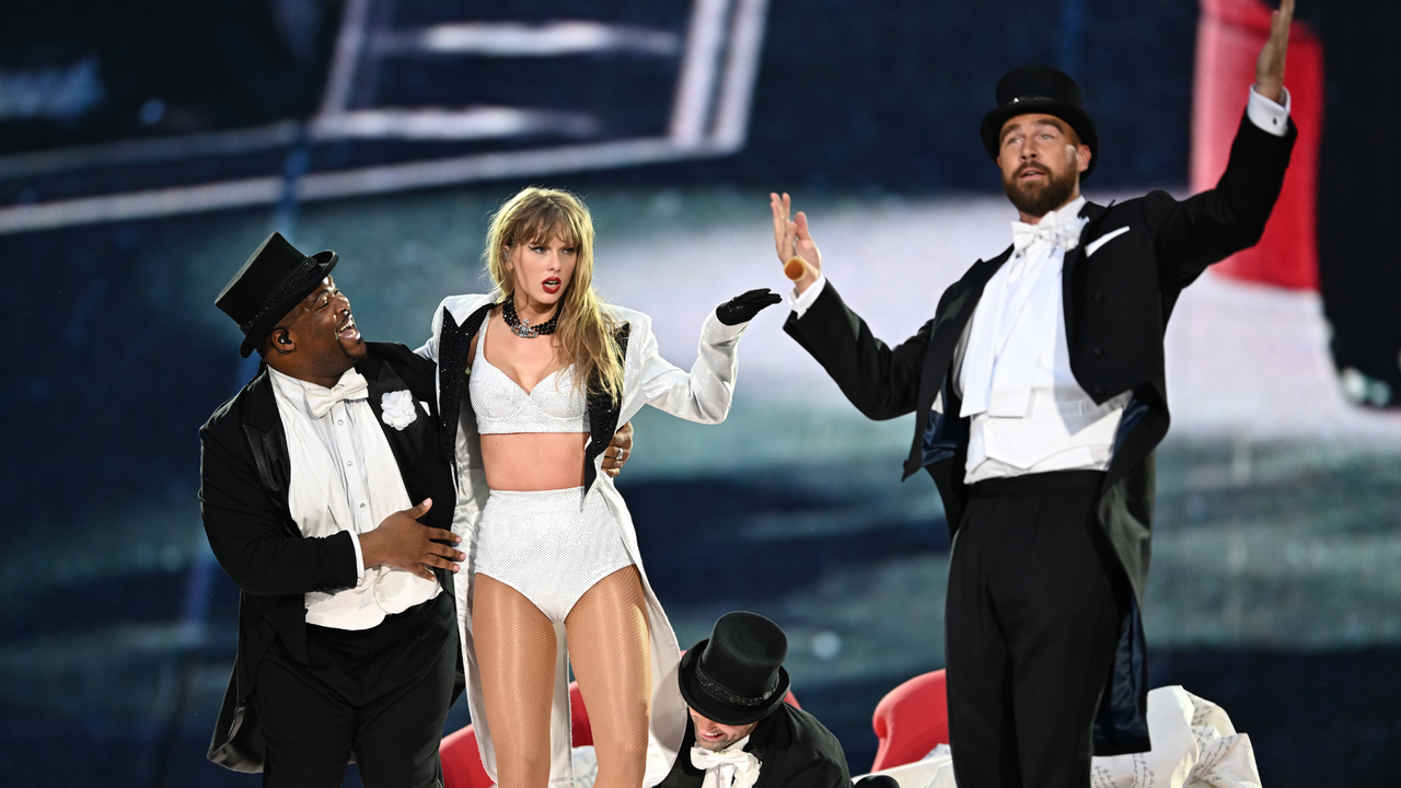 Taylor Swift and Travis Kelce on stage tribute