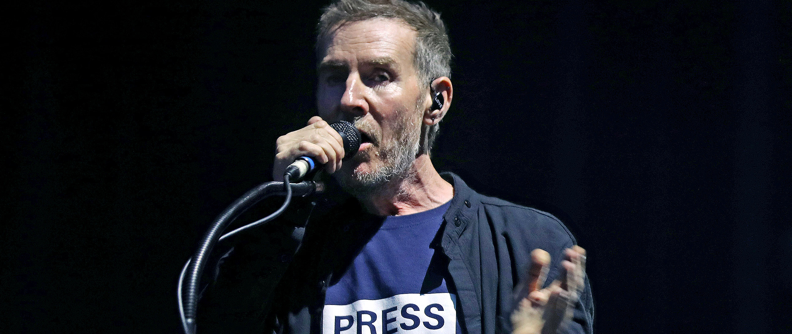 Robert Del Naja performing live with Massive Attack in 2025
