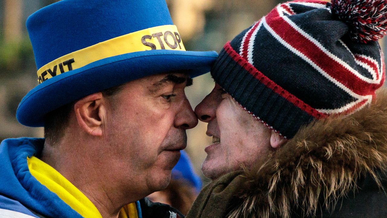 Anti-Brexit protester Steve Bray and a pro-Brexit protester square up outside the House of Commons