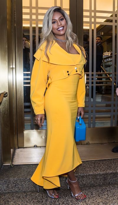 Clothing, Yellow, Fashion model, Fashion, Dress, Street fashion, Blond, Electric blue, Hairstyle, Shoulder,