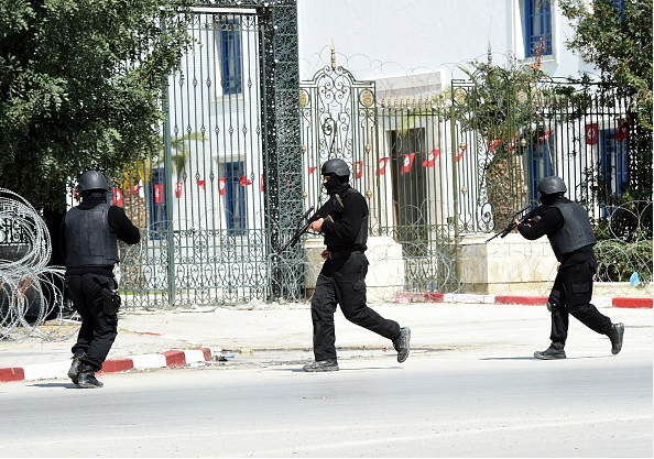 Tunisian security forces secure an area.