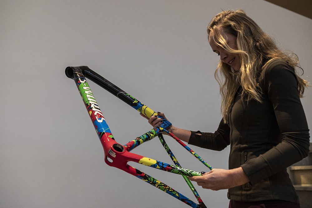 Anna van der Breggen holds her world champion Specialized Tarmac SL6 Disc