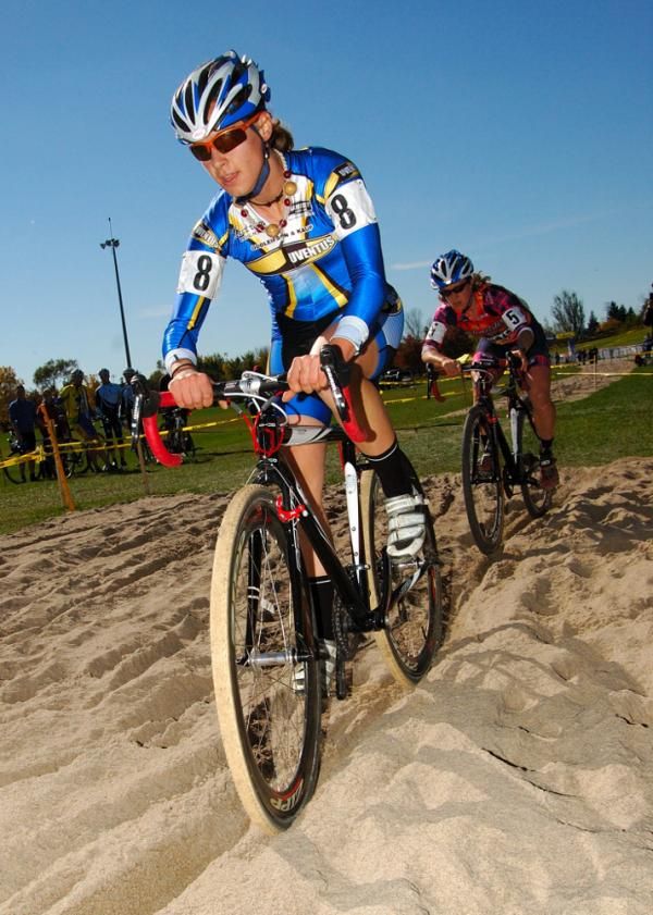 Pepper Harlton leads Carter through the sand pit as Elliott struggles in behind.