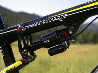 The proprietary DT Swiss-made rear shock uses a multiple chamber design that allows user-selectable travel settings.