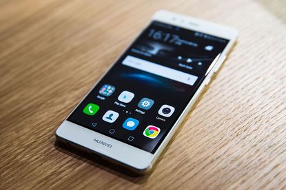 A pictures shows the new P9 smartphone by Chinese tech company Huawei during the phone's launch at Battersea Evolution in London on April 6, 2016.The P9 was created in partnership with German