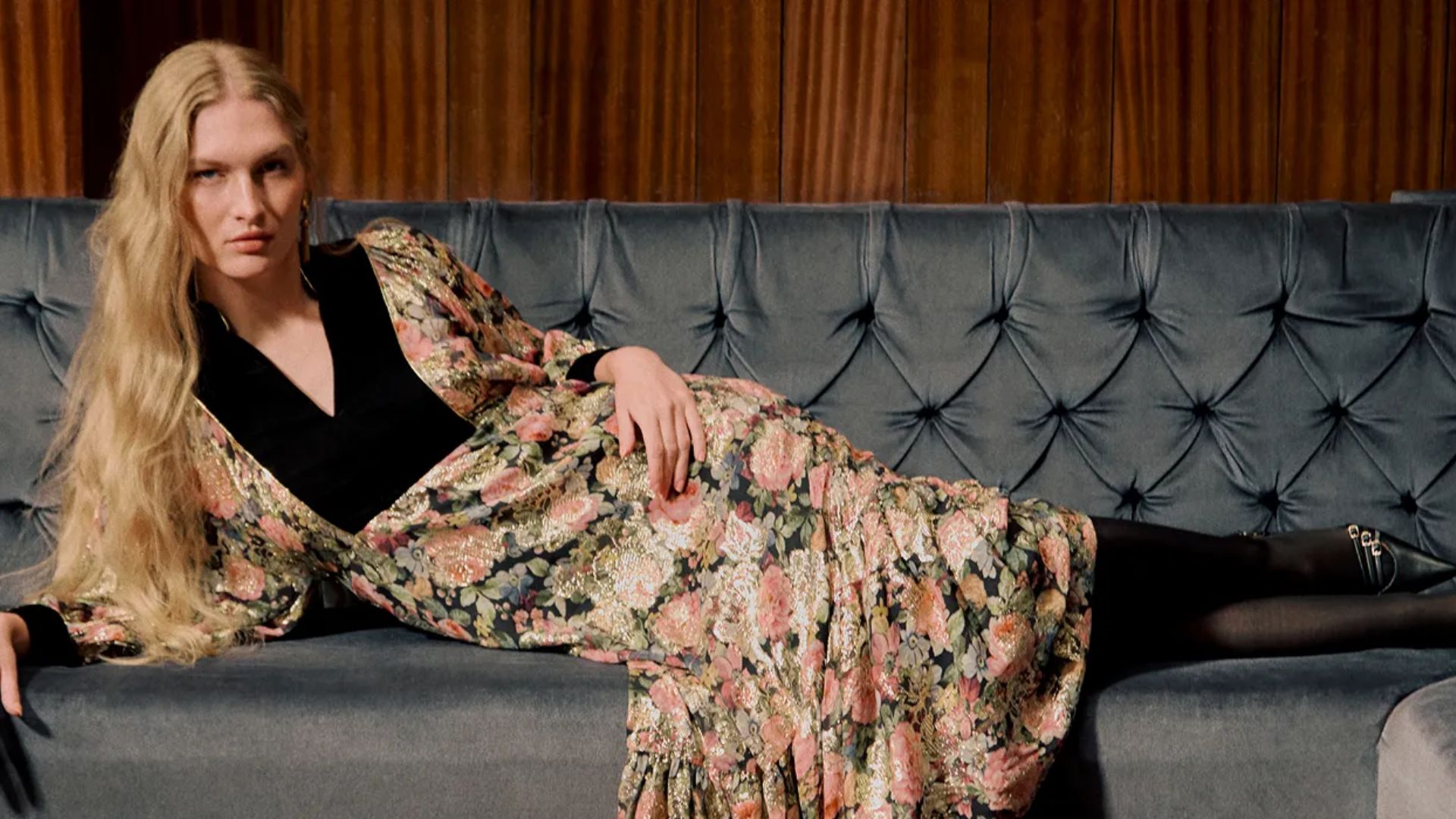 A model wearing a dress from the Monsoon x Queens of Archive collection