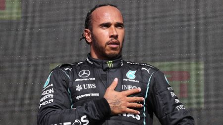 Lewis Hamilton on the podium following his win at Silverstone  