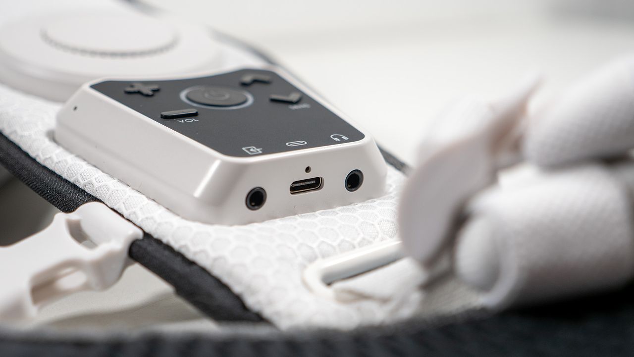 A close-up look at the control panel on the front of the Woojer Haptic Vest 3