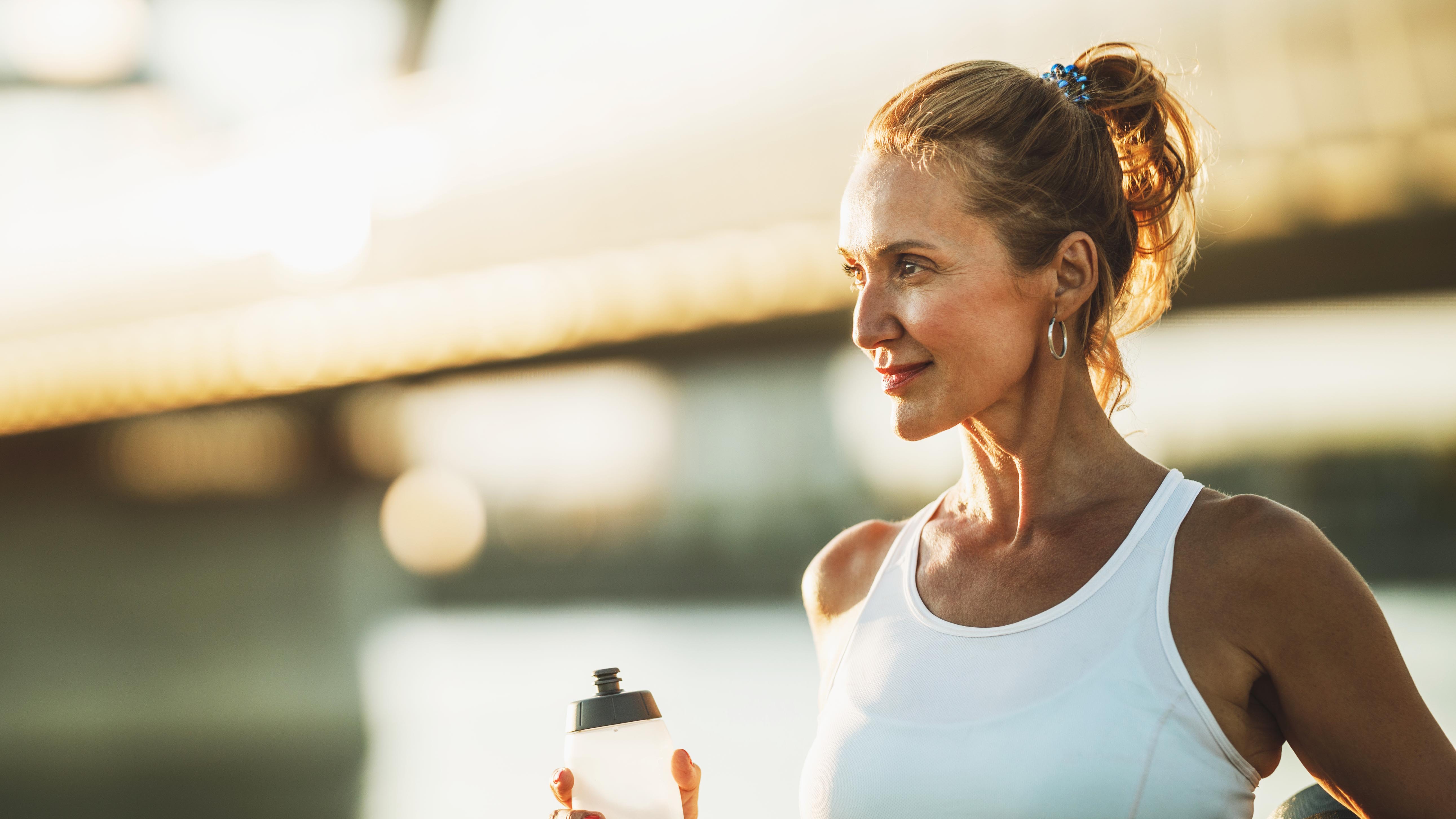 a middle aged woman working out 