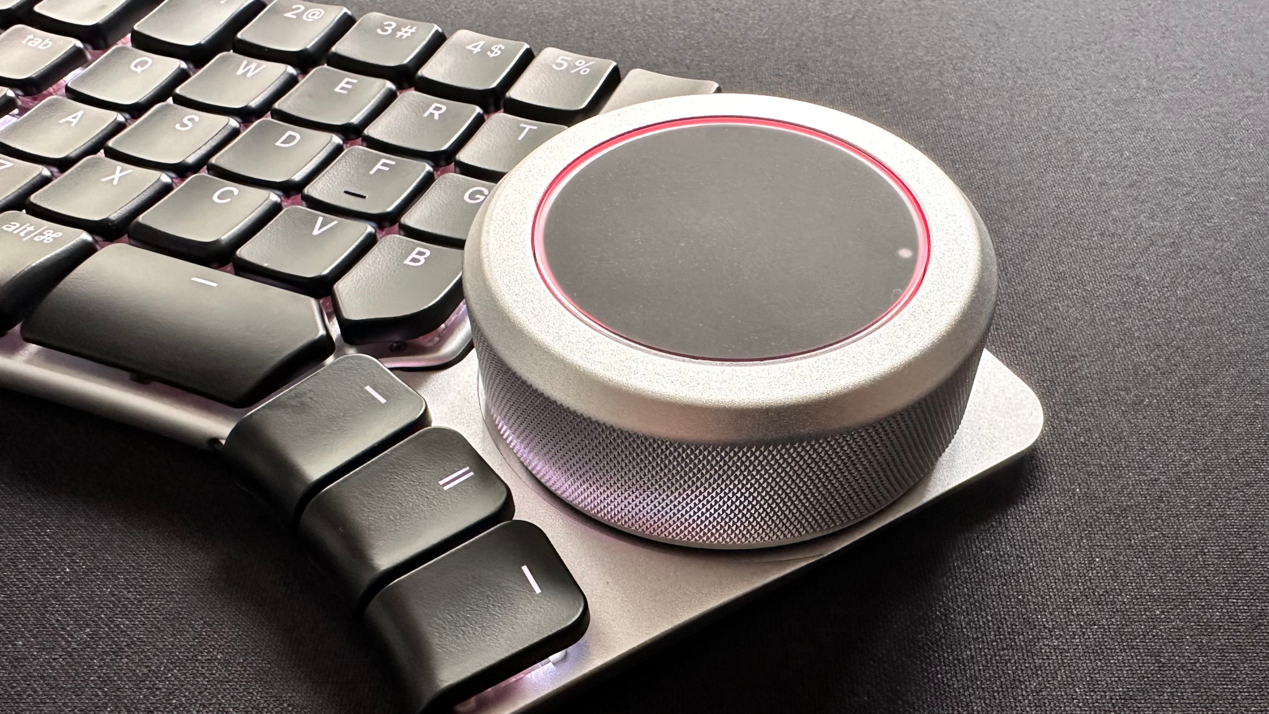 A close-up photo of the Tune module for the Naya Create ergonomic keyboard