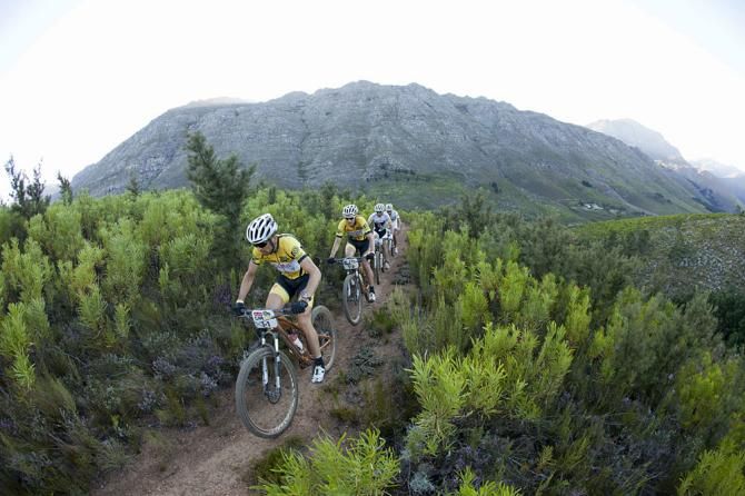 Christoph Sauser &amp; Jaroslav Kulhavy of Burry Stander-Songo lead Nino Schurter &amp; Florian Vogel of Scott-Swisspower