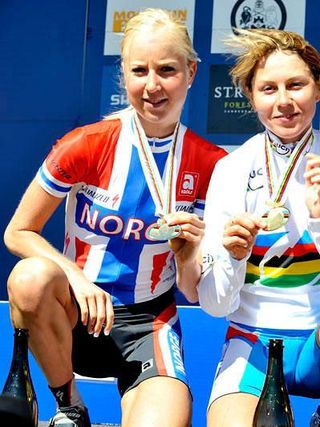 Lene Byberg (Norway), l, with her silver medal from XC Worlds
