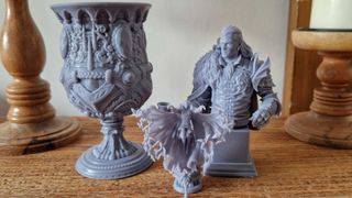 Models printed using the Anycubic Photon Mono M7 Pro, on a wooden table