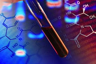 A researcher holds a vial blood against a background of chemical formulas.