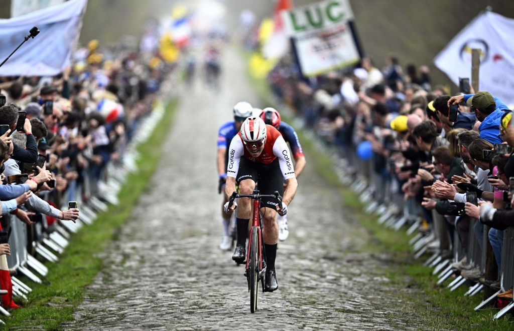 Illustration picture shows and The pack of riders pictured during pictured at the Trouee dArenberg cobbled road passage during the mens elite race of the ParisRoubaix cycling event 2566km from Compiegne to Roubaix France on Sunday 09 April 2023 BELGA PHOTO JASPER JACOBS Photo by JASPER JACOBS BELGA MAG Belga via AFP Photo by JASPER JACOBSBELGA MAGAFP via Getty Images