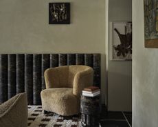 an earth tone room with a luxury chair