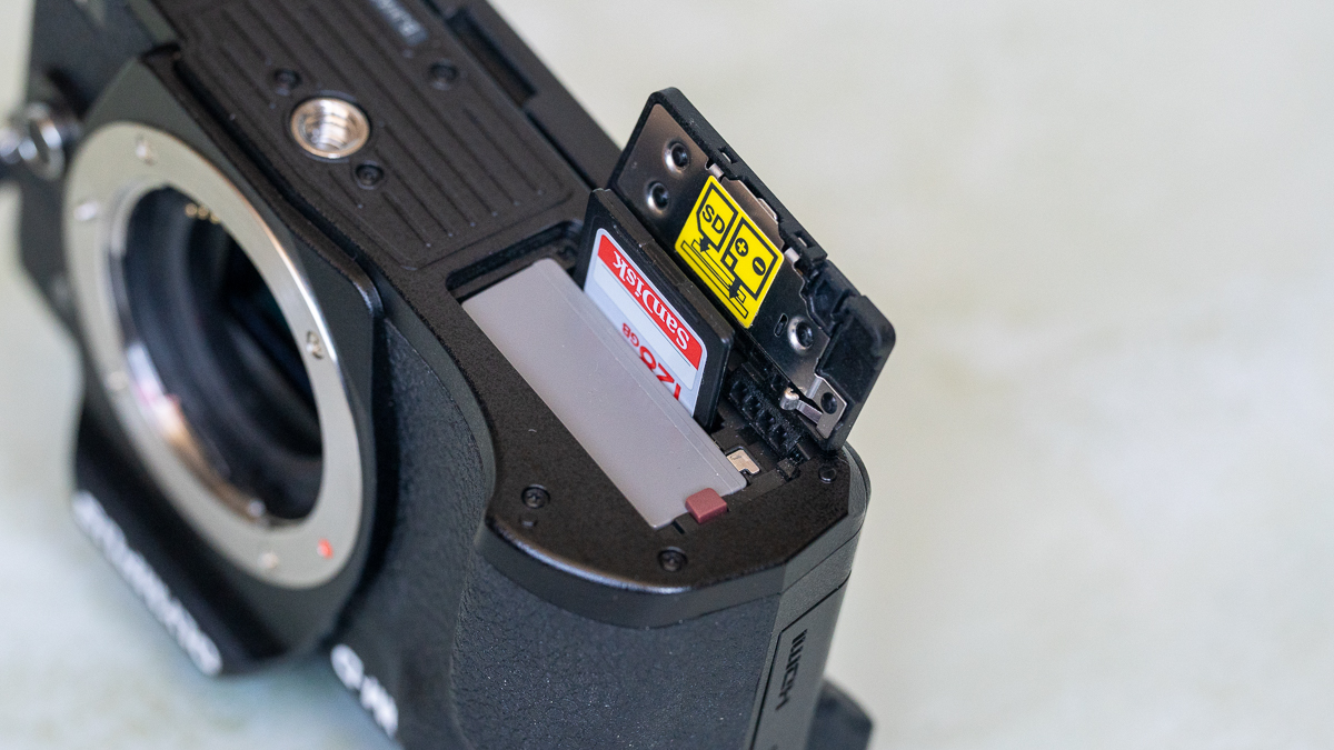 Olympus OM-D E-M10 Mark IV battery and card compartment