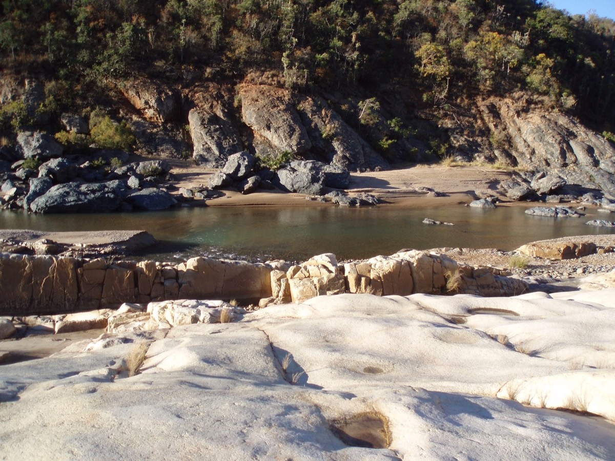 Granite that&#039;s 3.2 billion years old sits next to sedimentary rocks that date back 3 billion years at White Mfolozi Inlier, KwaZulu-Natal province, South Africa.